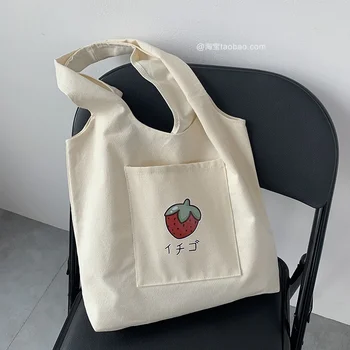 2023 alışveriş çantası Kadın Çantası Metin Desen Baskı Serisi Bej Kullanımlık Harajuku Banliyö Basit Büyük Kapasiteli moda alışveriş çantası